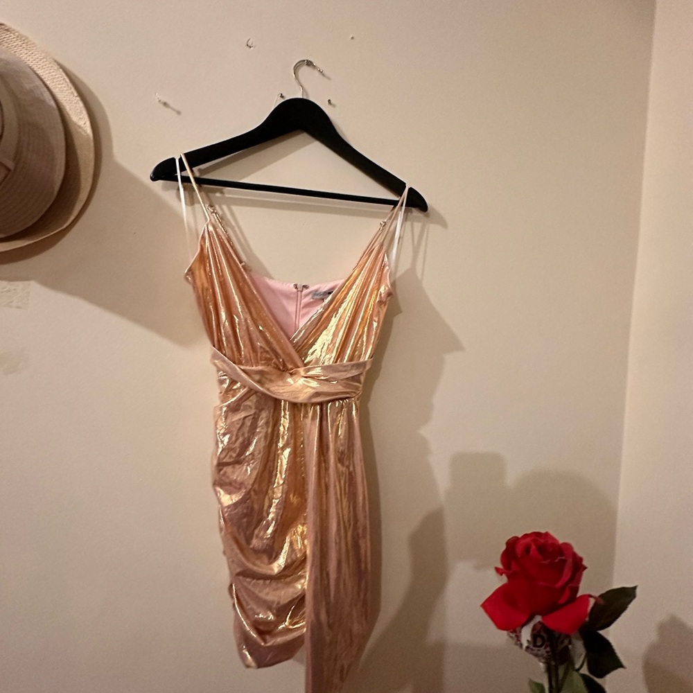 New without tags shiny dress on size small, party ready dress